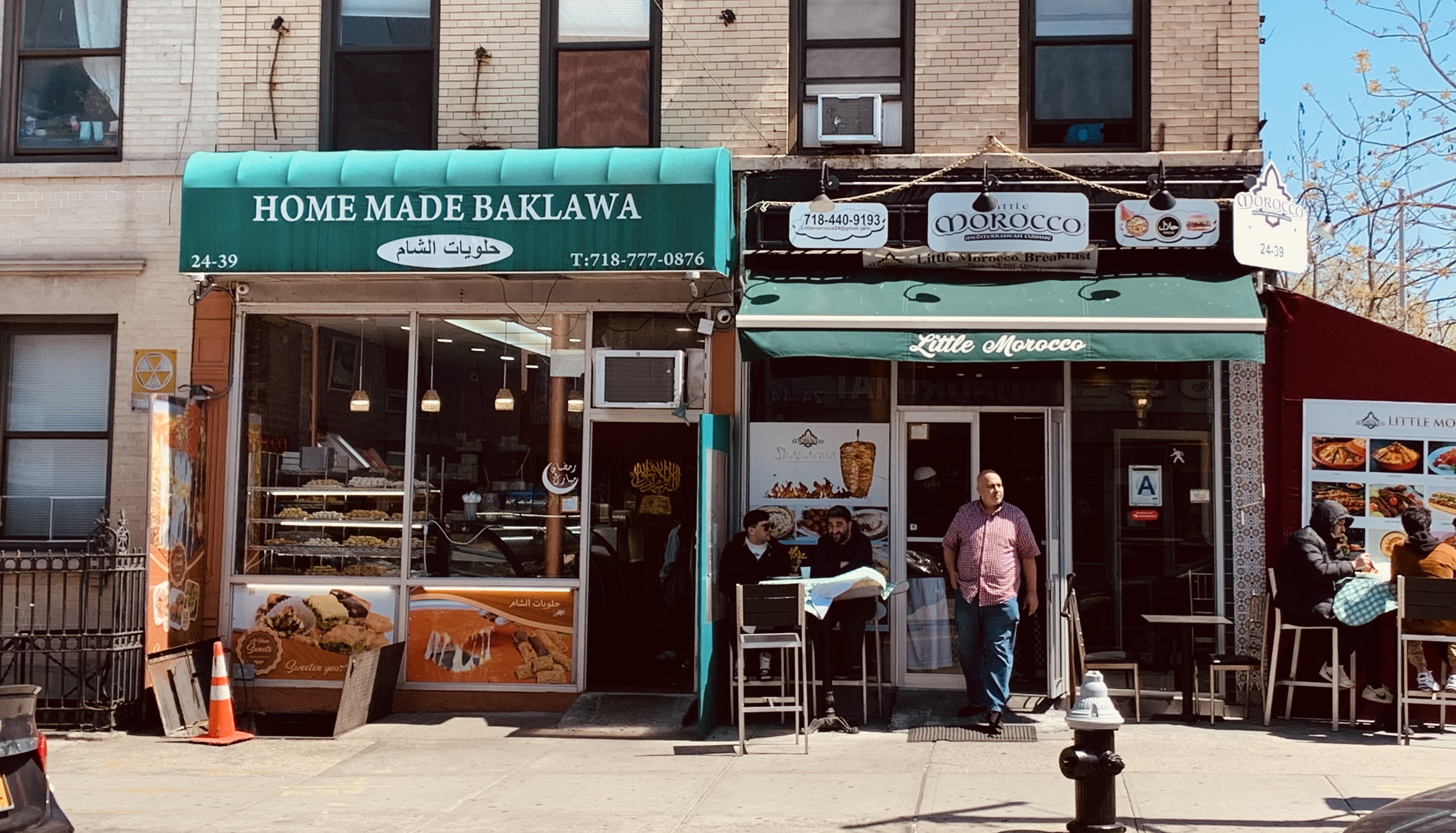 Two storefronts with people seated out front.